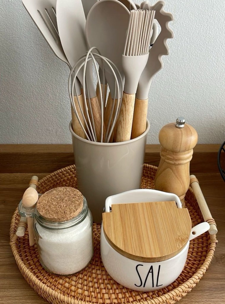 Closet Organisation – A neatly organised wardrobe with colour-coordinated clothes, space-saving storage boxes, and clutter-free shelves.