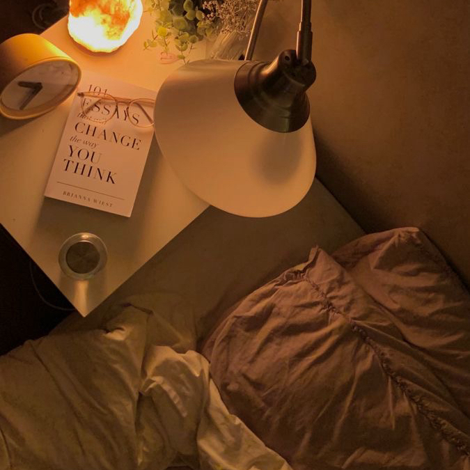 Relaxing in a minimalist living room after decluttering for a calm mind and stress free life 